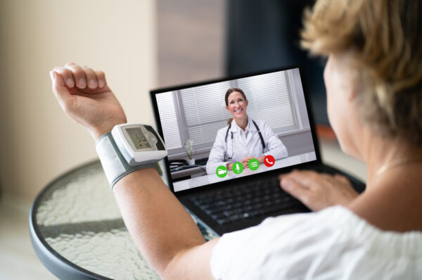 Telehealth Patient Making Hypertension Blood Medicine Test