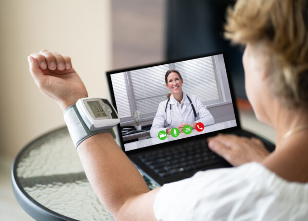 Telehealth Patient Making Hypertension Blood Medicine Test